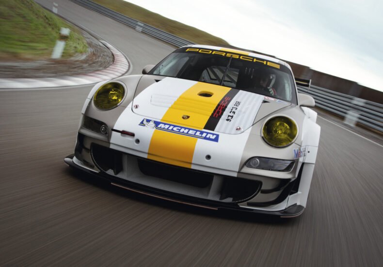 2011 Porsche 911 GT3 RSR on track front view