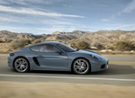 2017 Porsche 718 Cayman on the road side view
