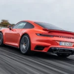 2021 Porsche 911 Turbo Coupe on track rear view