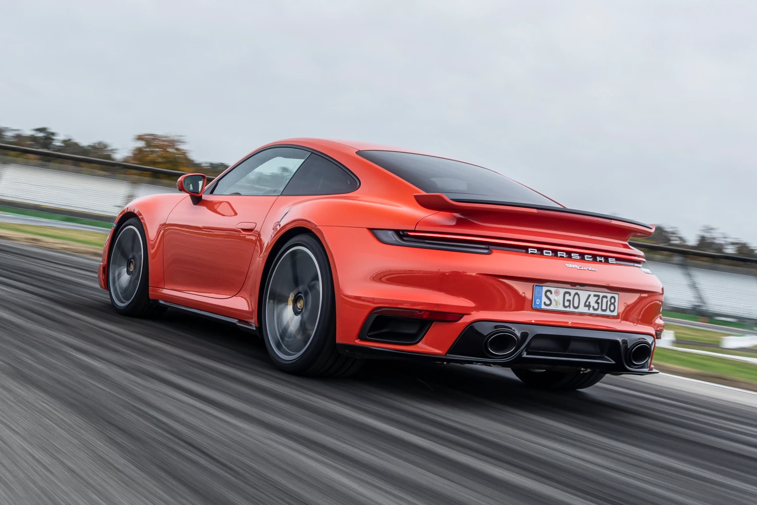 2021 Porsche 911 Turbo Coupe on track rear view