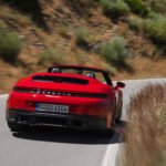 2025 Porsche 911 Carrera Cabriolet on the road