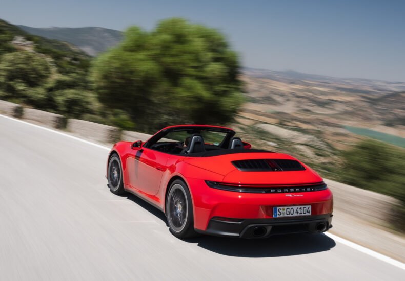 2025 Porsche 911 Carrera Cabriolet on the road rear view