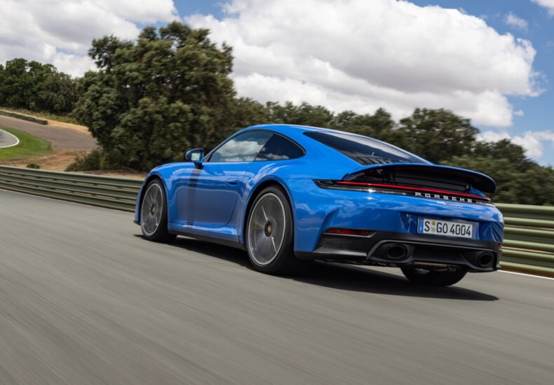 2025 Porsche 911 Carrera on the track rear